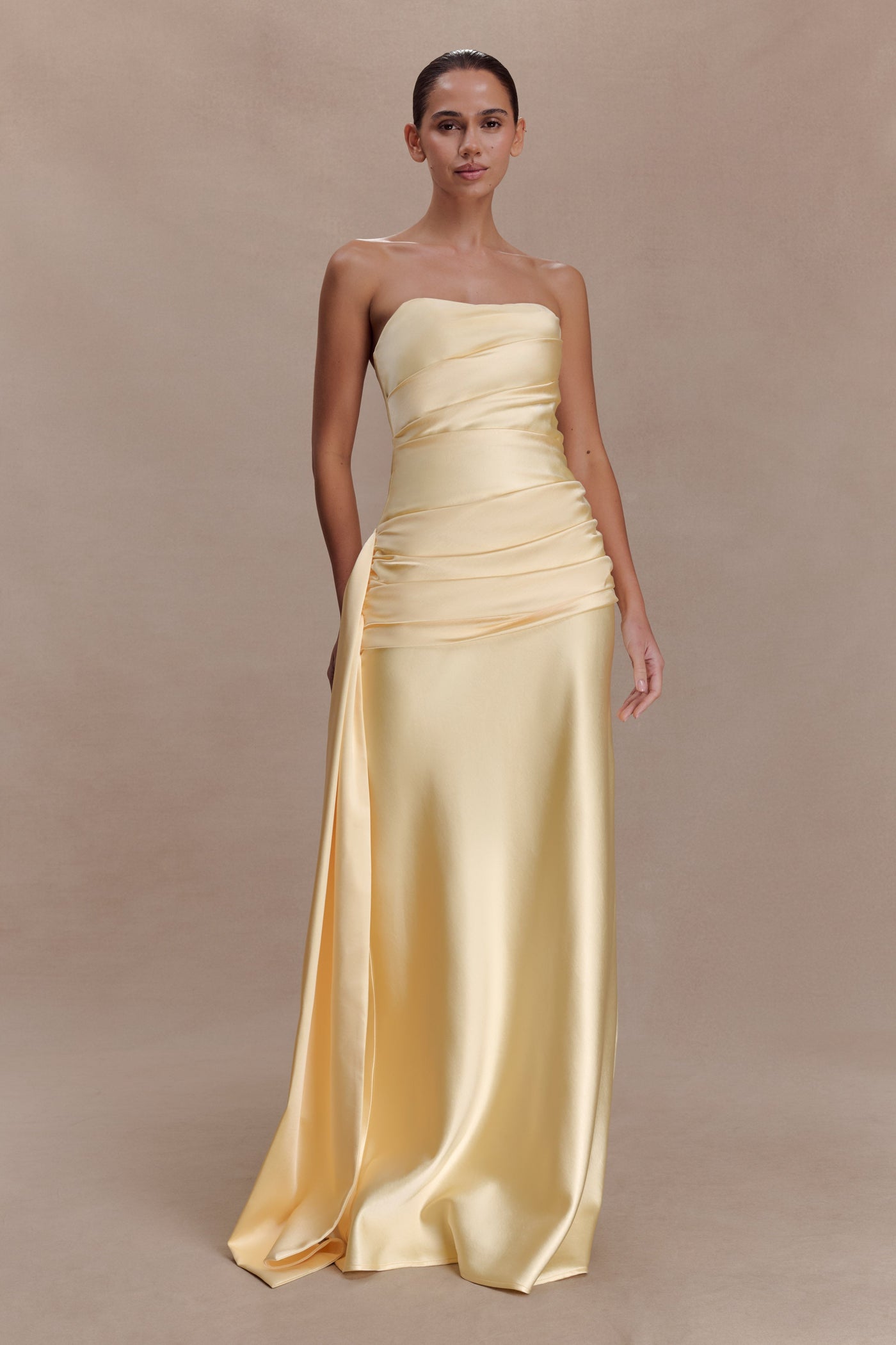 Noa Belle — woman in a champagne satin gown